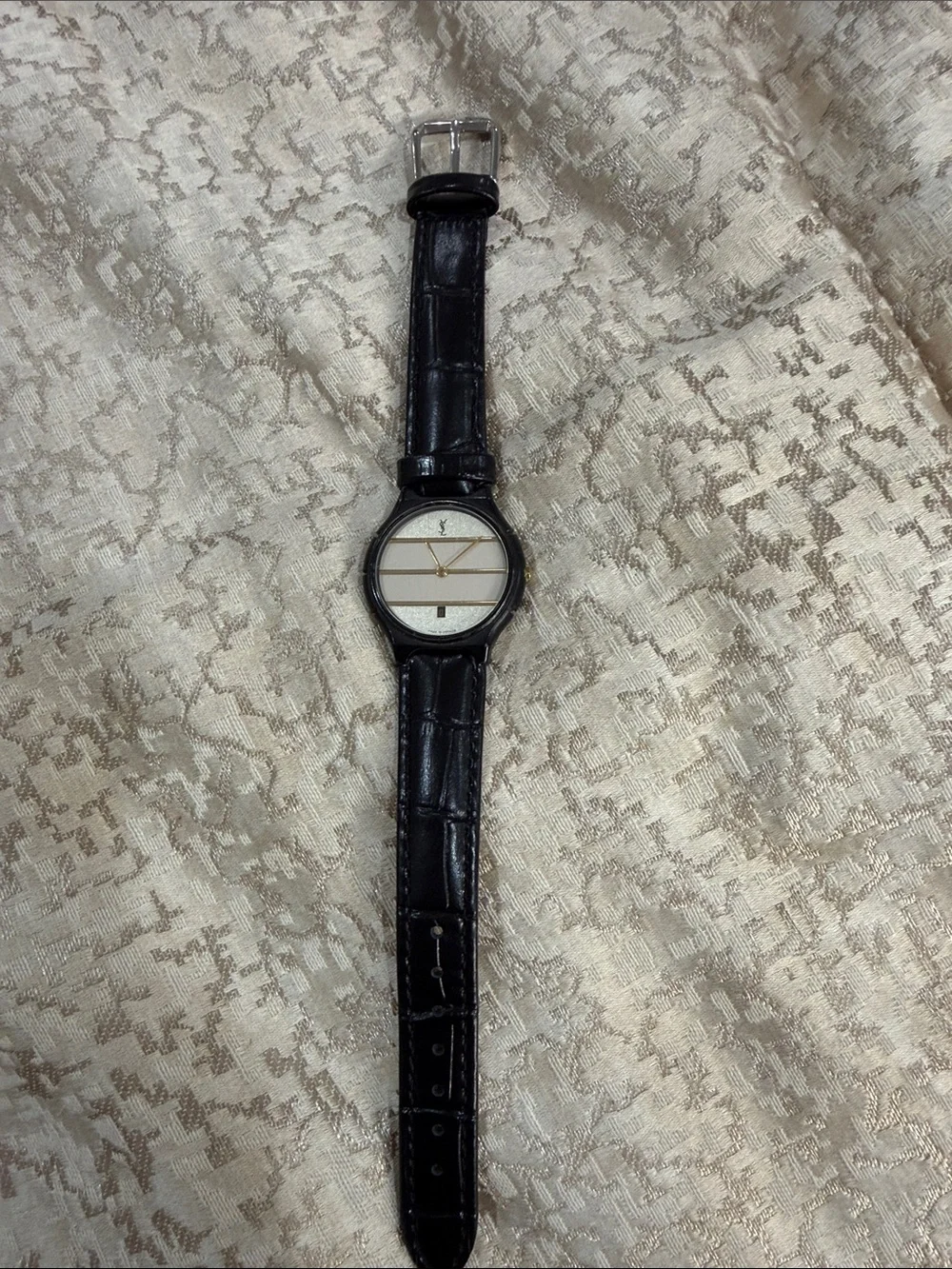 Yves Saint Laurent Black Leather Watch with Gold Accents and Silver Dial